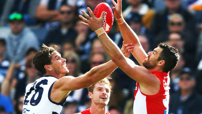 Defence - Heath Grundy marks in front of Tom Hawkins