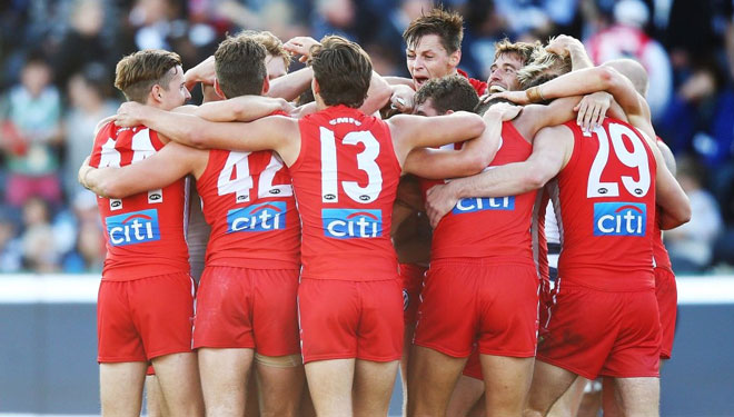 Swans celebrate win on the ground